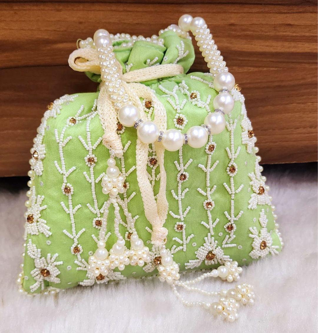 Designer Tubelight Singh Partition Silk Handcrafted Potli in Green color-81651