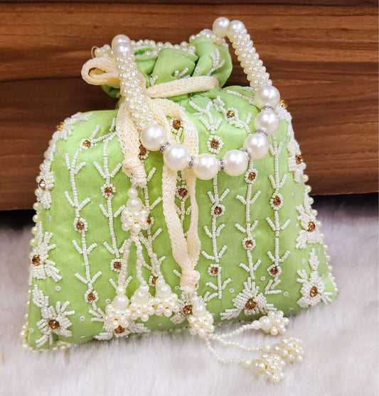 Designer Tubelight Singh Partition Silk Handcrafted Potli in Green color-81651