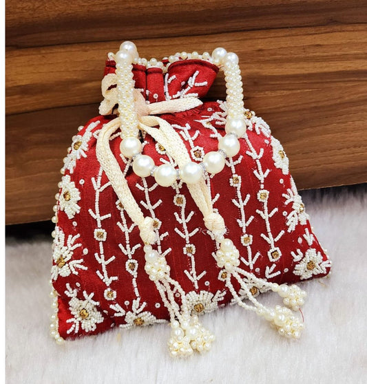 Tubelight Singh Partition Silk Handcrafted Potli in Maroon color-81656