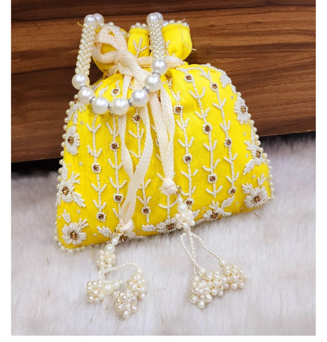 Tubelight Singh Partition Silk Handcrafted Potli in Yellow color-81659